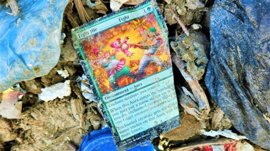 MTG cards landfill - photo of a green enchantment card in a landfill