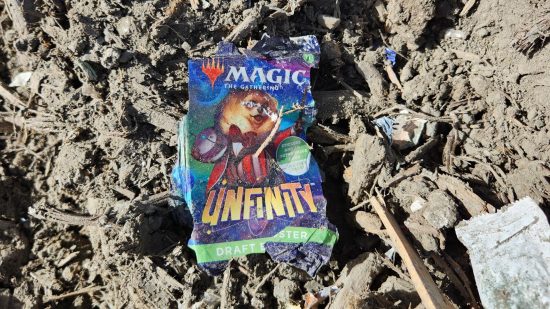 MTG cards landfill - Unfinity booster product packaging in landfill