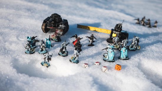 Warhammer 40k at the South pole - a battle shot of Primaris infiltrators facing off against black-armoured Imperial Guard