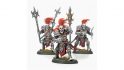 Warhammer fantasy army generated by AI - humanoid creatures with red mohawks, screaming white faces, holding strange staffs
