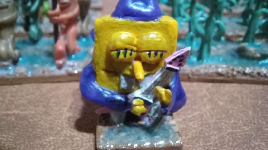 Sponge Bob Warhammer army - SpongeBob in a wizard hat playing a guitar, made from cold porcelain