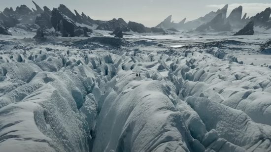 DnD movie a glacier with spiked mountains behind it.