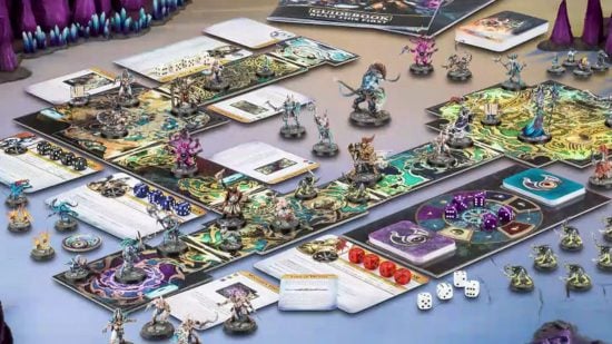 Best Warhammer board games guide - Games Workshop sales image showing the entire board setup for Warhammer Quest Silver Tower including miniatures, board tiles, dice, and more