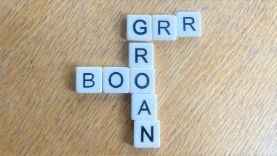board games - scrabble tiles laid out to spell the words 'grr', 'groan', and 'boo'