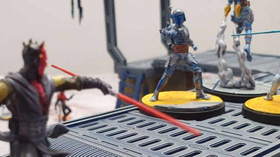 Star Wars Shatterpoint core set review -Darth Maul prepares to charge a Mandalorian
