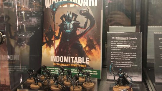Warhammer 40k Necron display of the Flayerszahkt Dynasty - a black and teal Necron force, custom designed by Samuel Badcock via a Make a Wish partnership with Games Workshop - the display includes a custom White Dwarf magazine