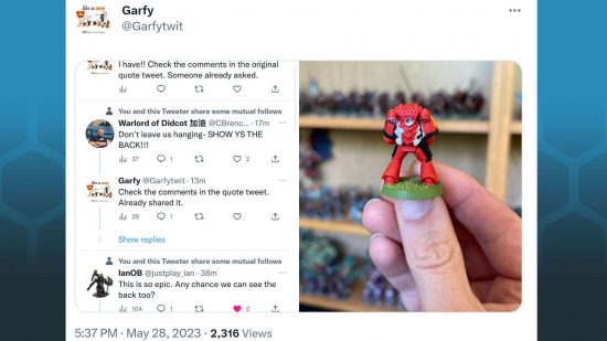 Screencapture of tweet by Garfy , showing the back of the famous Space Marine