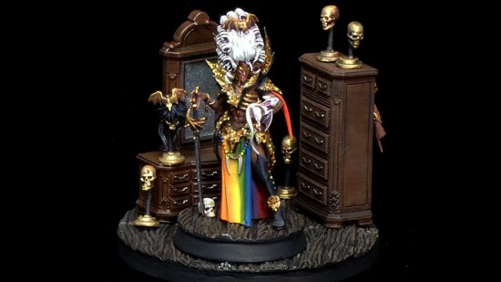 Age of Sigmar vampire limited edition model Anasta Malkorion, painted as a drag queen, with white pompadour wig, amazing sequined high collar, and rainbow tabard, posed in her boudoir