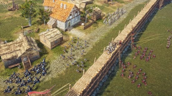 Best grand strategy games on PC guide - Knights of Honor 2 Sovereign screenshot showing units besieging a town wall during a real time siege battle
