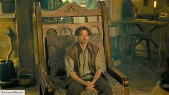 DnD movie VFX artists react - Paramount Pictures still of Bradley Cooper sitting in a giant chair in Dungeons and Dragons: Honor Among Thieves