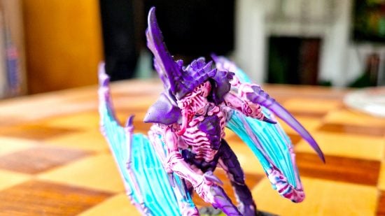 Warhammer 40k Leviathan Tyranids with Citadel Contrast Paints - Author photo showing the Leviathan Tyranids Winged Tyranid Prime model, painted in purple, zoomed in close
