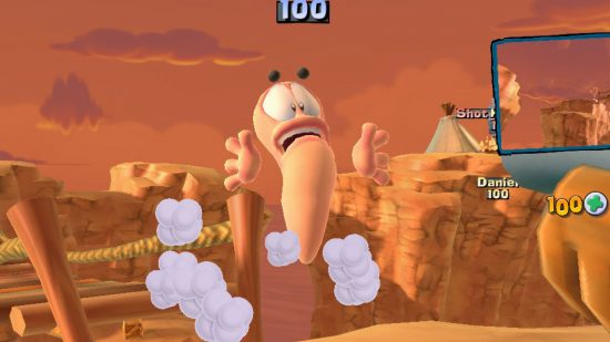 Worms board game - a worm being hit through the air.