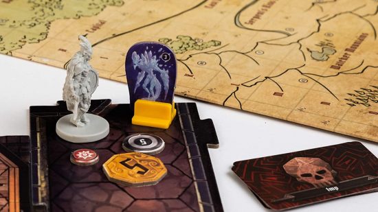 Miniature, standee, cards, and tokens from Gloomhaven, one of the best fantasy board games