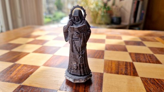 How to 3D print miniatures guide - author photo showing a gothic statue model printed using the Ankermake M5 FDM printer