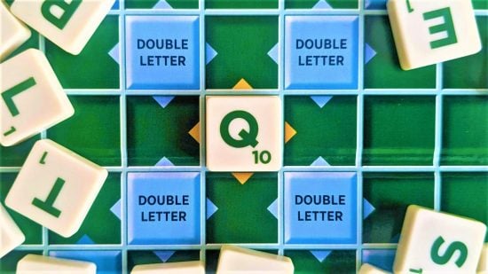 Scrabble words with Q - photo of a Q tile on a Scrabble board