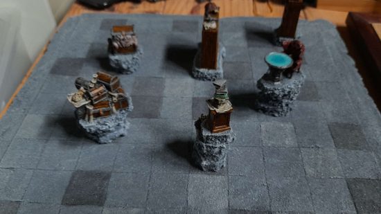 Brawl Arcane is like weirdo Warhammer chess - home-made board by Brett Evans, with scenery pieces
