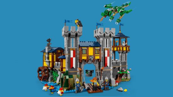 Best Lego dragon sets: Medieval Castle. Image shows a classic medieval castle made of Lego with a dragon swooping by.