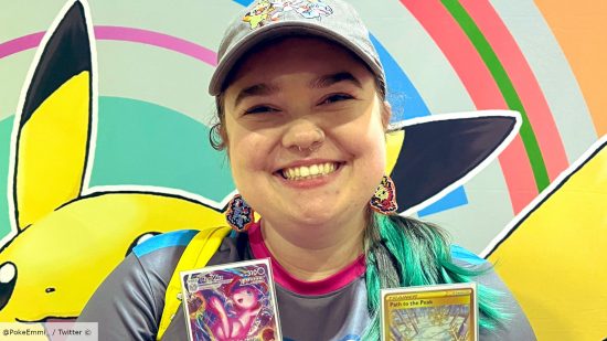 Pokemon TCG Girl Power TCG group welcomes gender minorities - Girl Power TCG photo showing group founder Emmi Stonier holding two prize cards at a Pokemon event