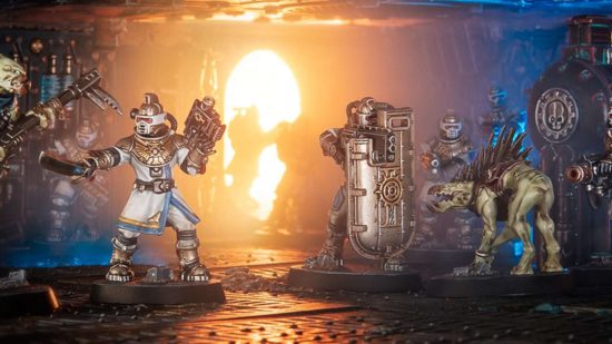 Warhammer 40k Kill Team design team recruits new matched play designer - diorama by Games Workshop, Imperial Navy Breachers enter a ship via a brightly lit doorway