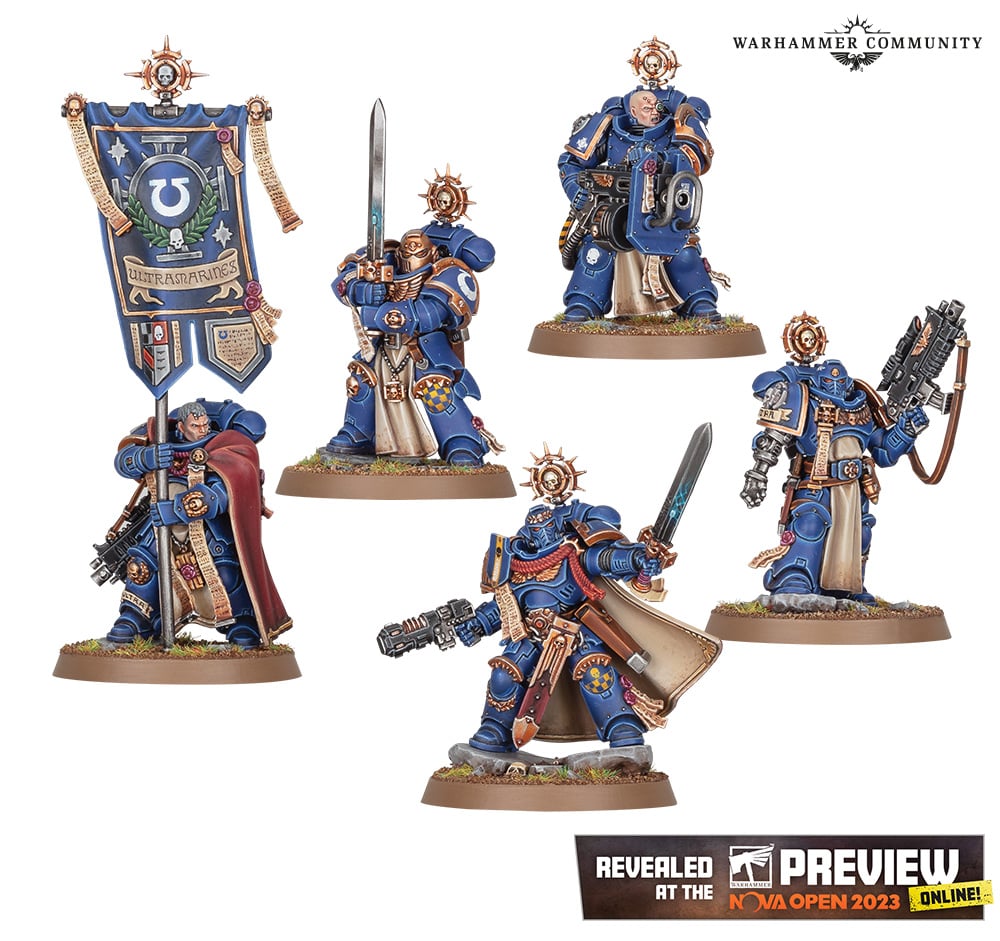 Warhammer 40k Space Marine Heroes of the Company - a squad of five power-armored warriors in heavily ornamented armor, one carrying a banner, another wielding a blade in two hands