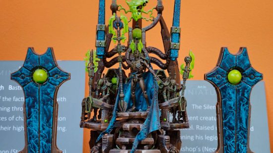 Warhammer Art in Miniature exhibition - Szarekh the Twice Dead King, a robotic necron overlord on a floating dais flanked by floating monoliths,. painted by Josh Clough