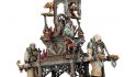 Warhammer Cities of Sigmar Pontifex Zenestra, an ancient woman riding in a palanquin carried by fanatics