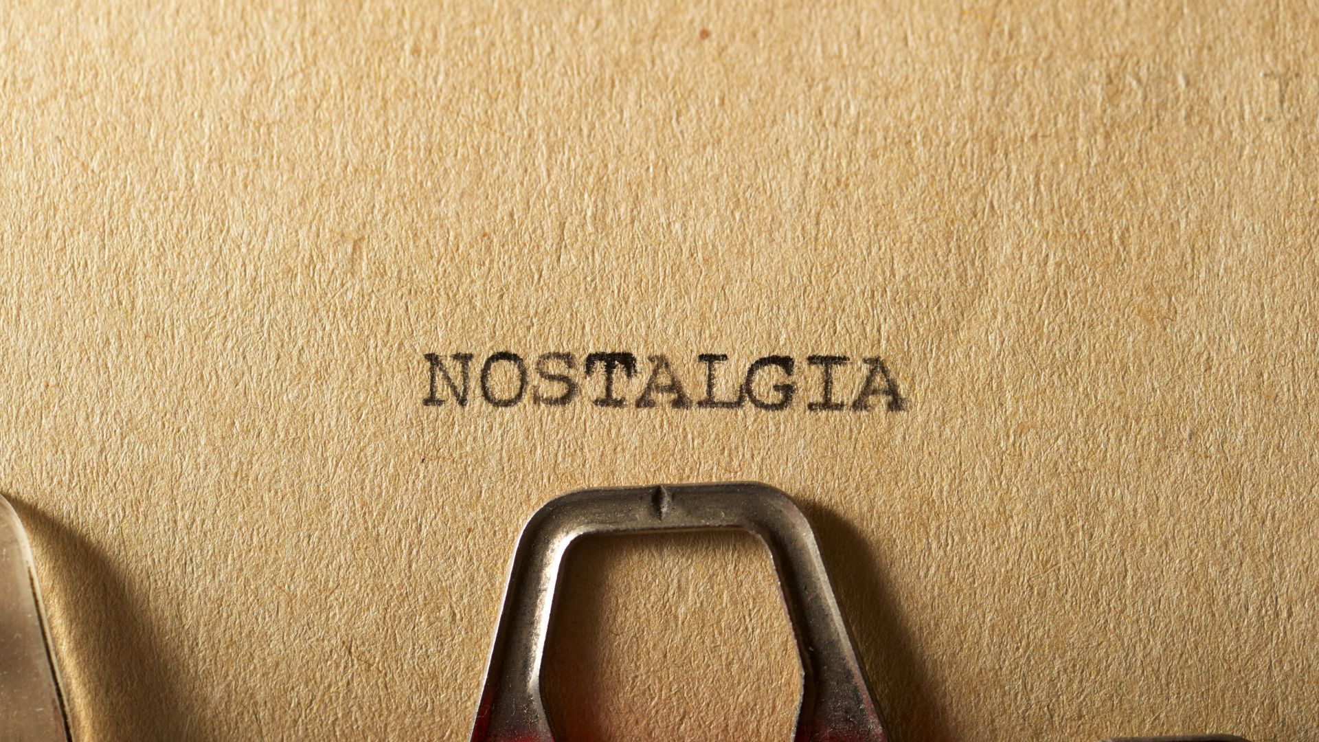 Warhammer fans hate change and when things stay the same - the word NOSTALGIA on brown paper in a typewriter