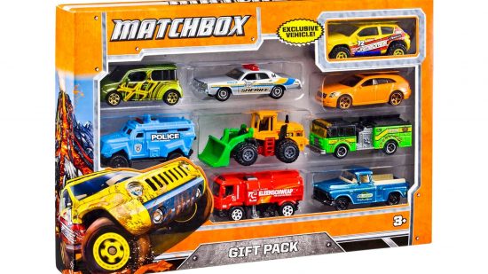 Best Matchbox cars, marketing photograph by Mattel - nine colorful die-cast toy cars and other vehicles visible through the plastic window of a yellow packet