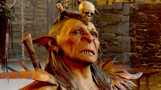 BG3 mod Hirelings Unleashed lets you add NPCs to your party - Priestess Gut, a goblin ruler with sharp teeth, pointed ears and nose, one missing eye, and a hat with a small skull on it.