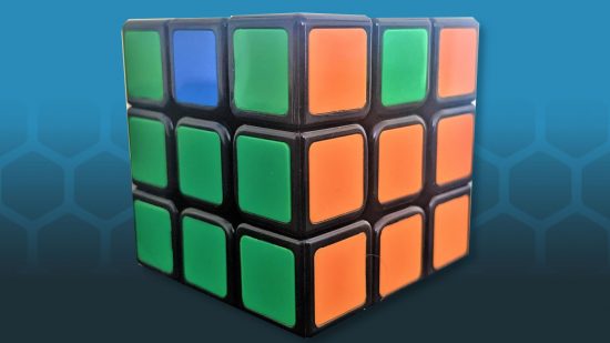 How to solve a Rubiks Cube - photo of a Rubik's Cube with the final edges still to be solved