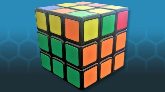 How to solve a Rubiks Cube - photo of a Rubik's Cube with two rows on each face solved