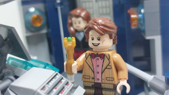 Lego Doctor Who review image showing a Lego Eleventh Doctor in the TARDIS with a Lego Clara.