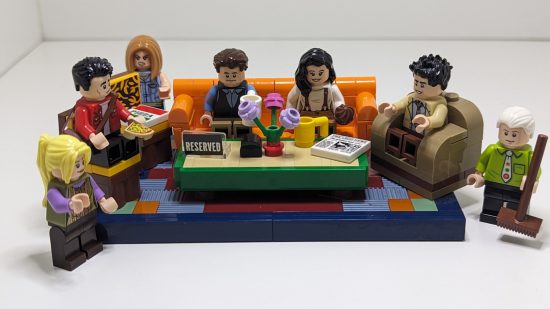 Lego Friends Central Perk review image showing all the minifigures together on the sofa.