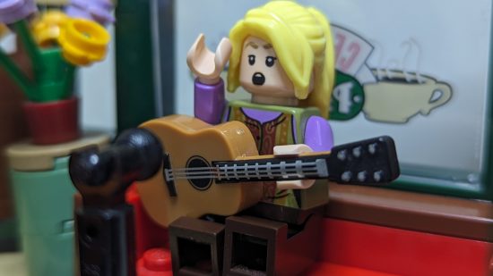 Lego Friends Central Perk review image showing the Phoebe minifigure.