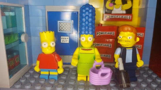 Lego Simpsons Kwik-E-Mart review image showing the Bart, Marge, and Snake minifigures.