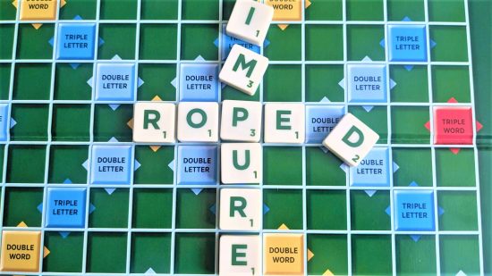 Scrabble strategy - photo of suffixes and prefixes being added to Scrabble words