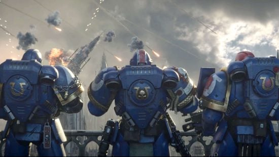 Space Marine 2 coop multiplayer - pictured from behind, three Space Marines in the blue power armor of the Ultramarines watch a Tyranid assault on an Imperial city