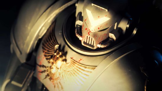 Screenshot from the Warhammer animation Astartes by Syama Pedersen, close up of a Space Marine in power armor, with a spatter of blood across his armor