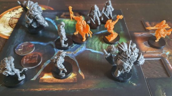 Bardsung review - plastic miniatures, yellow hero miniatures including a paladin and a dwarf berserker in a room full of monsters