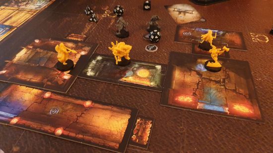 Bardsung review - plastic yellow miniatures of heroes explore a dungeon made of tiles