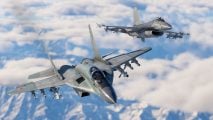 Best Combat Flight Simulators guide - Game Screenshot from DCS flight sim showing two modern fighter jet aircraft flying toward the camera, armed with multiple missile armaments