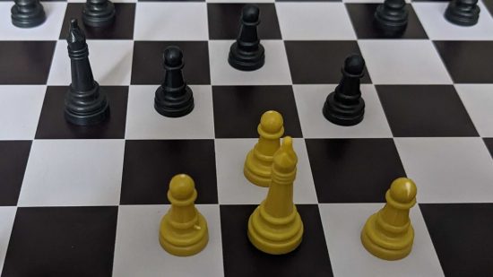 Chess strategies - photo of black and white pawns and bishops on a chessboard