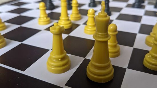 Chess stratgies - photo of a white rook and king next to each other on a chessboard