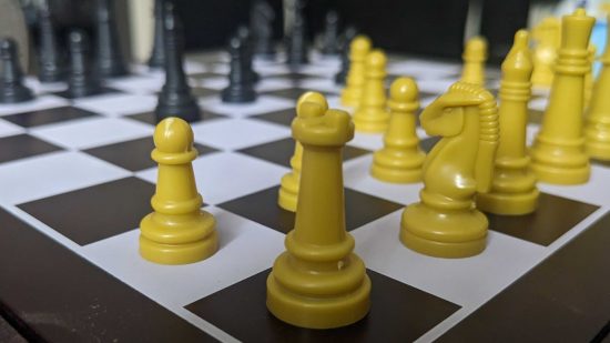 Chess strategies - photo of a chessboard, with the white rook nearest the camera