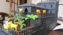 Plastic cats and palm trees on the balconies of the Scales and Ales Tavern DnD Inn kit