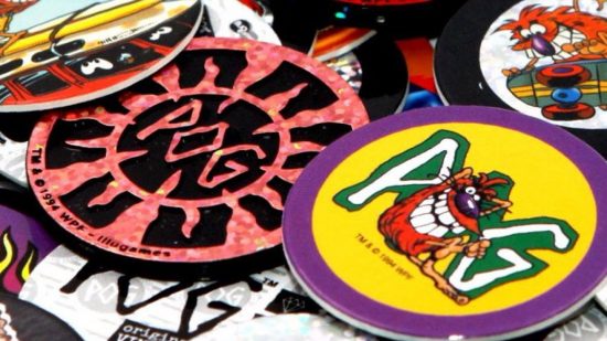 pogs - pink and yellow pogs