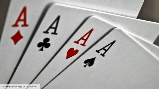 Poker rules - close-up photo of four aces