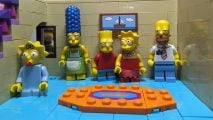 Lego Simpsons House review image showing the Lego versions of the family in their living room.