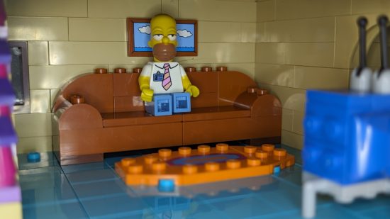 Lego Simpsons House review image showing Homer relaxing on the couch.