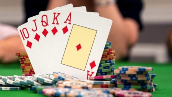 Poker rules - a hand of cards and poker chips